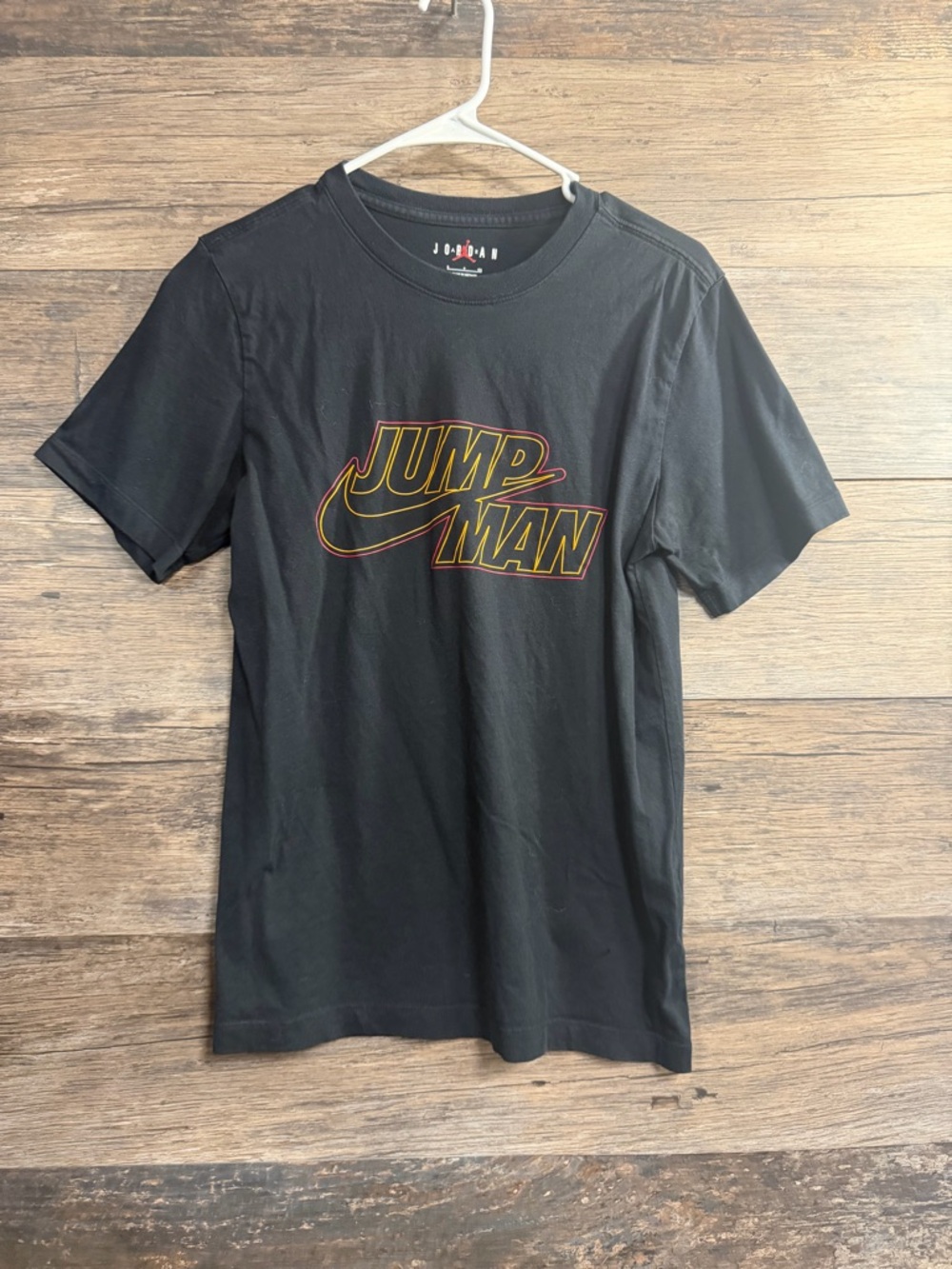Jordan Black Short Sleeve Tee with Red and Yellow Outlined Jumpman